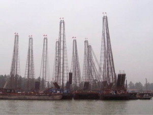 Sand excavation ships in Luoma Lake.