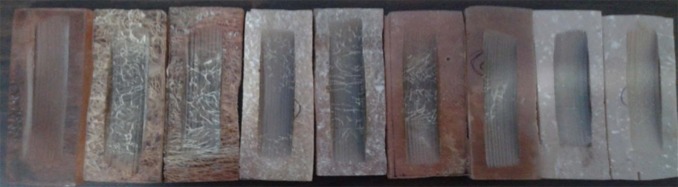 Abraded specimens of various composites.
