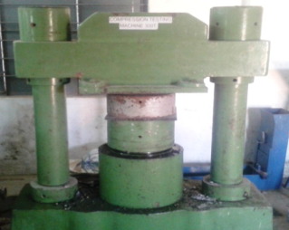 Universal testing machine – compression testing.