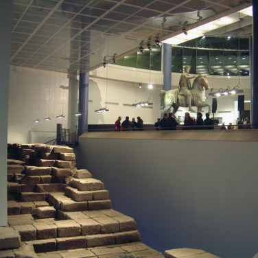 New Hall seen from the trench containing the foundation wall of the Temple of ...