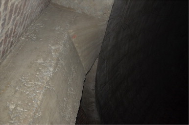 Concrete columns supporting the concrete shell dome, contorting with ...