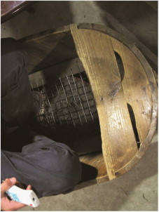 A traditional fire basin and its user.