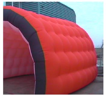 Cylindrical pavilion formed by a double layer membrane with tension ropes