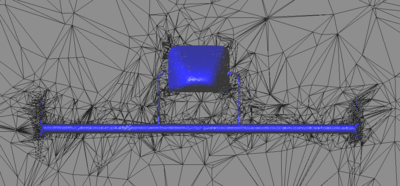 Fluid mesh with refinement strategy 2 after 5 refinement steps - The fluid mesh is cut at the front wing of the Formula 1 car (blue).