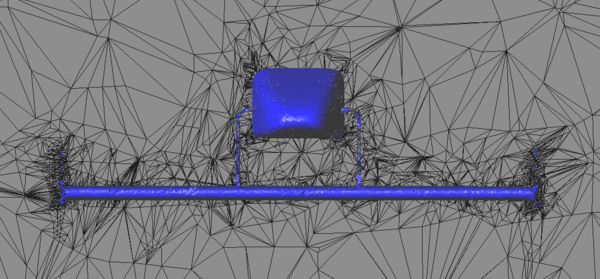 Fluid mesh with refinement strategy 2 after 5 refinement steps - The fluid mesh is cut at the front wing of the Formula 1 car (blue).