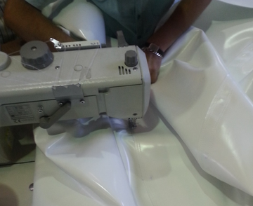 Costura de la  punta de la cámara exterior del tubo hinchable